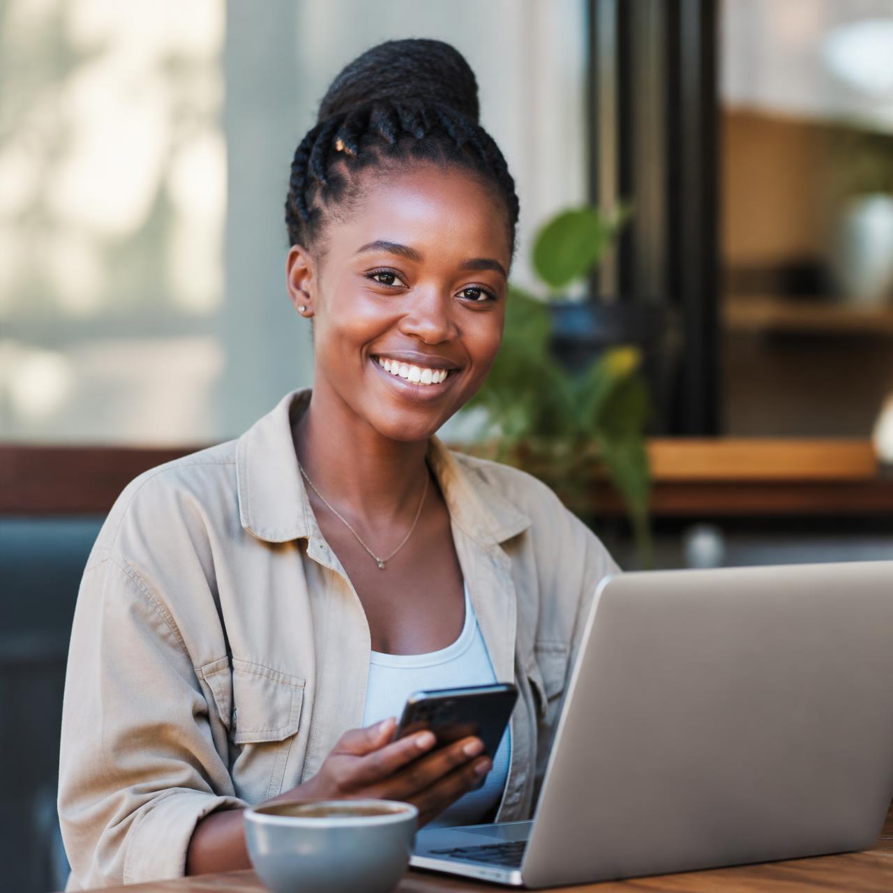 A TaskiPay member completing a survey on her phone in Nairobi